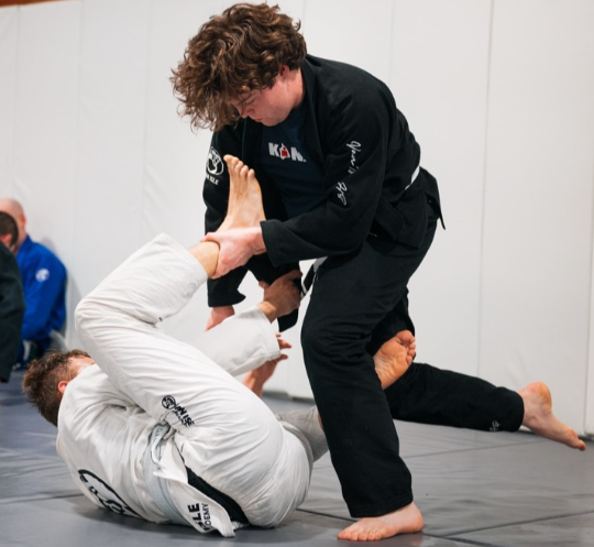 BJJ students sparring at Van Isle Jiu Jitsu