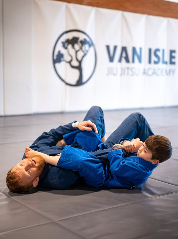 Father and son training together at Van Isle Jiu Jitsu Academy